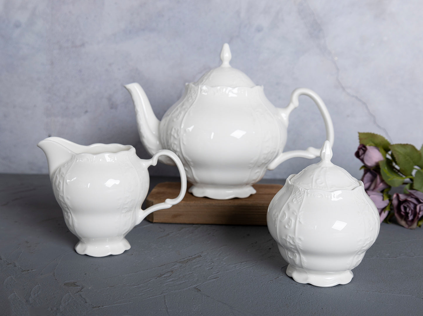 Elegant White Embossed Dinnerware Set with Tea Service for Any Occasion