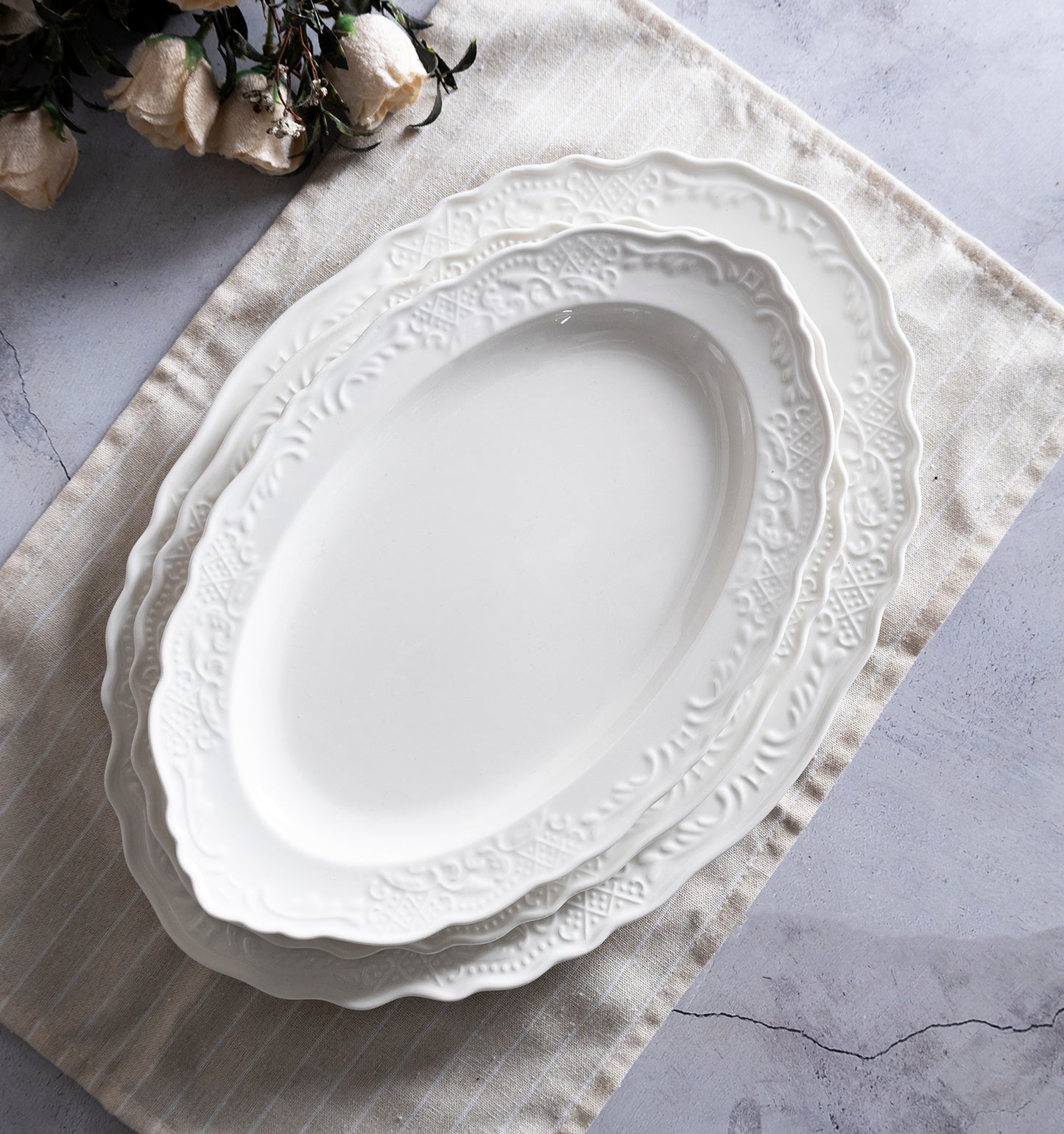 Elegant White Embossed Dinnerware Set with Tea Service for Any Occasion